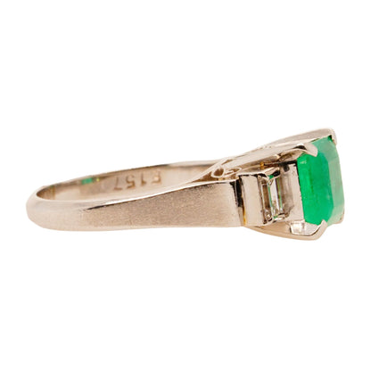 Platinum Princess Shaped Emerald With Side Diamonds Ring