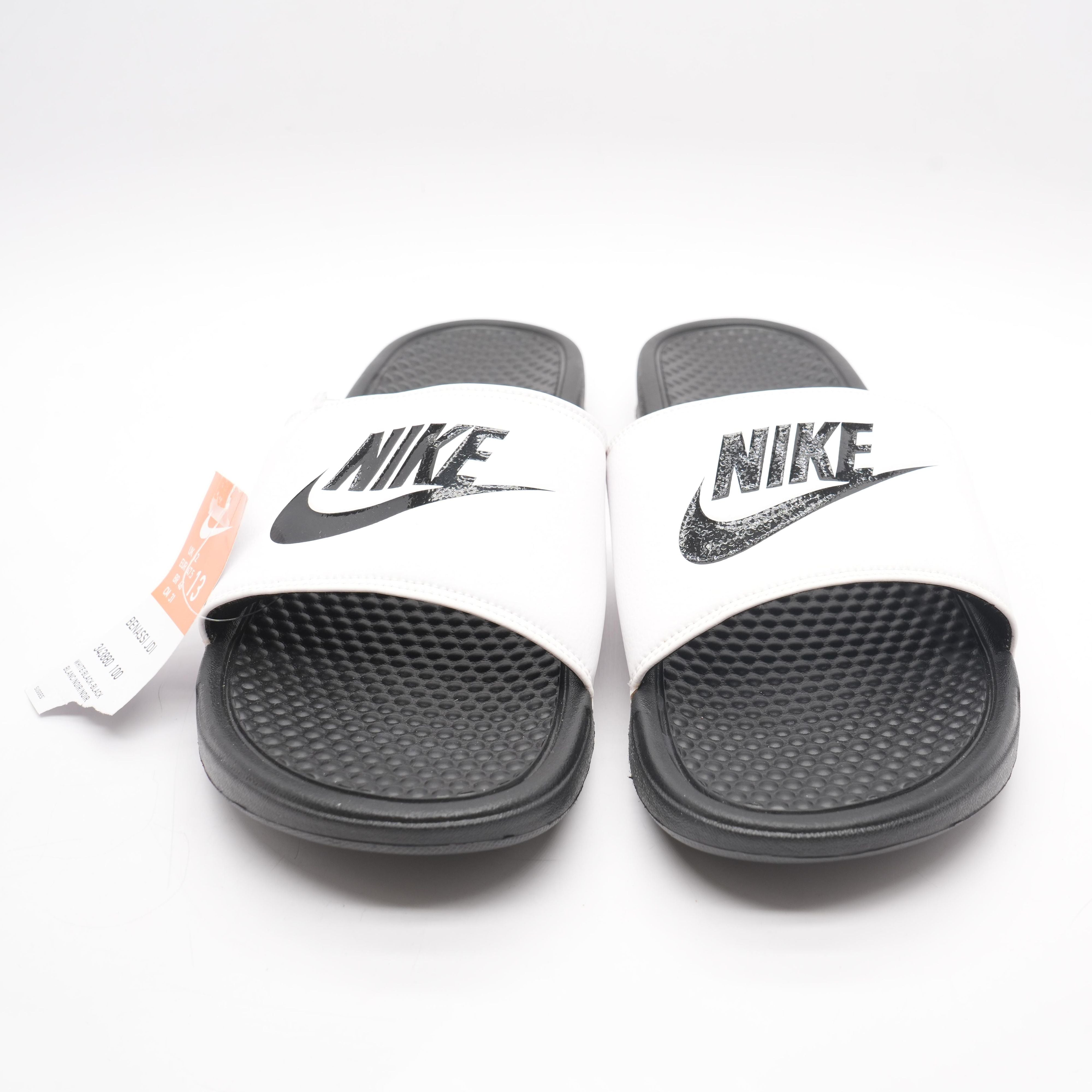 Nike benassi hotsell gold check slides