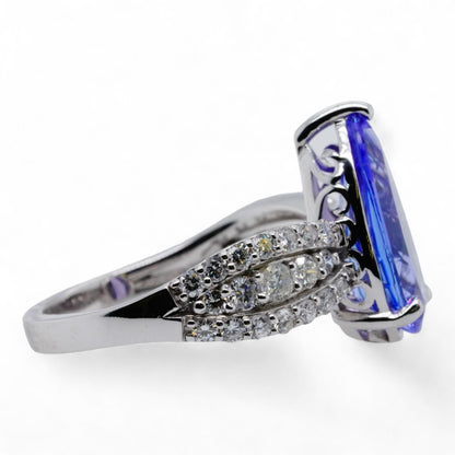 14K White Gold Pear Shaped Tanzanite With Round Diamond Accents Ring