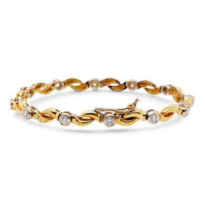 18K Two Tone Gold Twist Link Bracelet With Bezel Set Round Diamonds