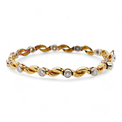 18K Two Tone Gold Twist Link Bracelet With Bezel Set Round Diamonds