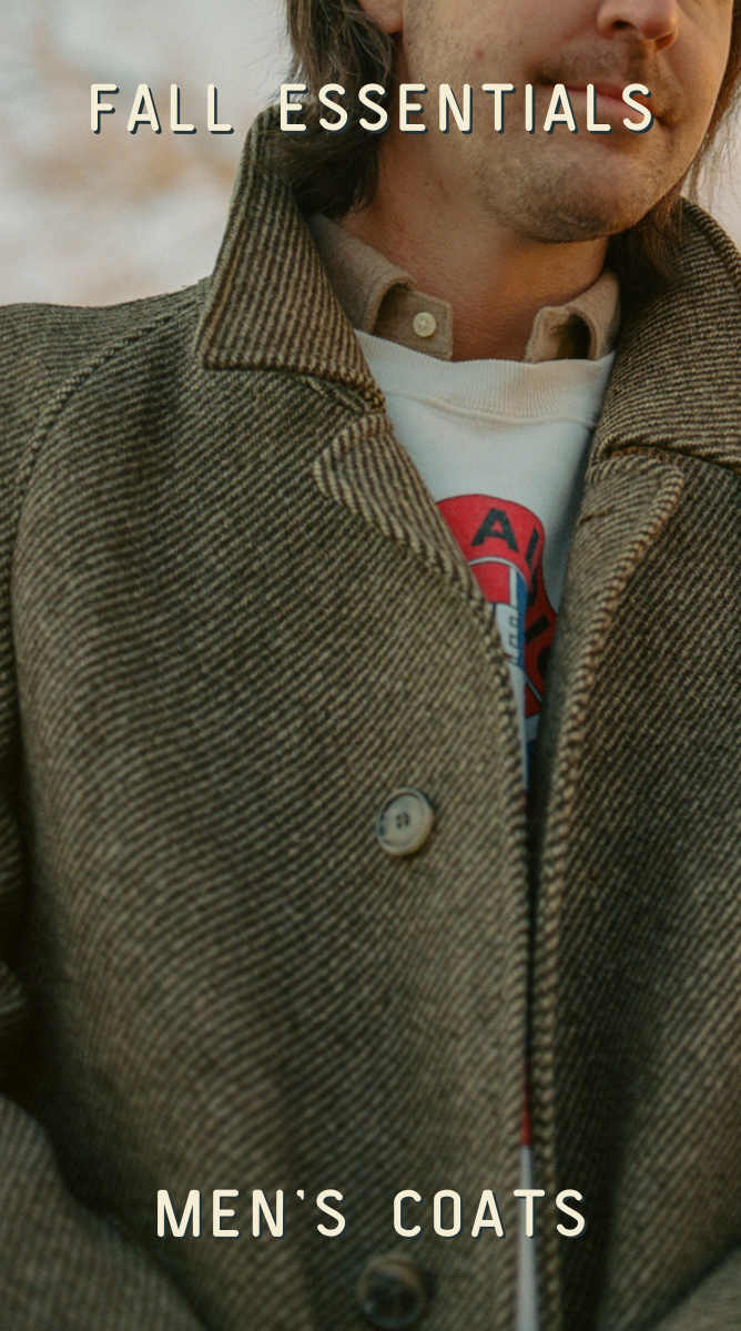 a person wearing a heavy tweed coat with caption: "Fall Essentials. Men's Coats" 