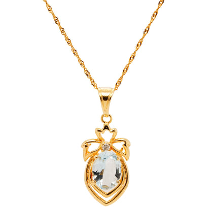 18K Gold Oval Blue Topaz And Diamond Accent Pendant Necklace