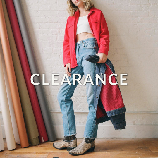 a person in red shirt and blue jeans leaning against the wall. Caption: "Clearance" 