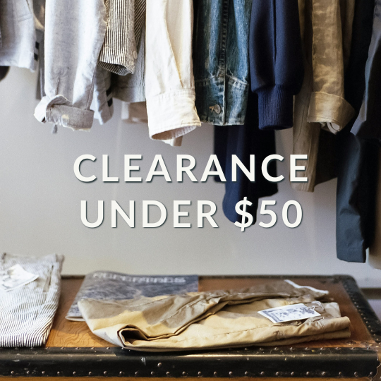 a rack of clothing with caption: Clearance Under $50