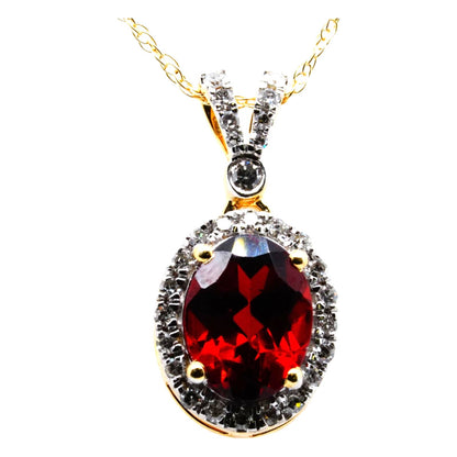 14K Gold Oval Garnet With Diamond Halo Pendant Necklace