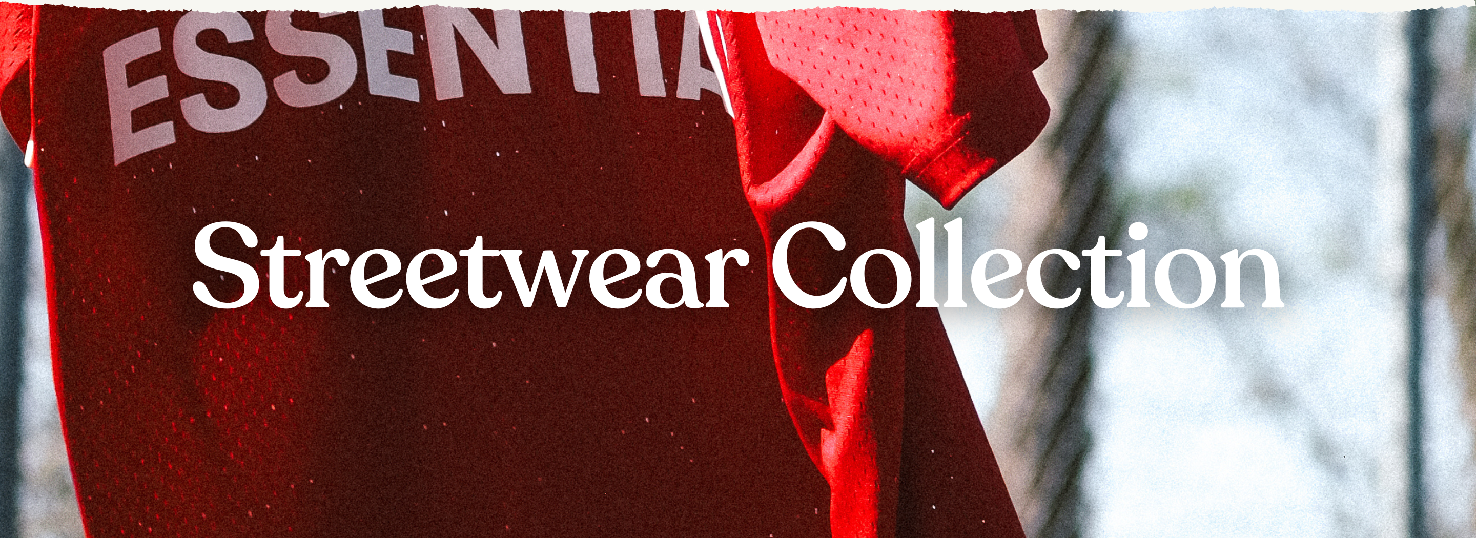 a red jersey in the air with caption: "Streetwear Collection"